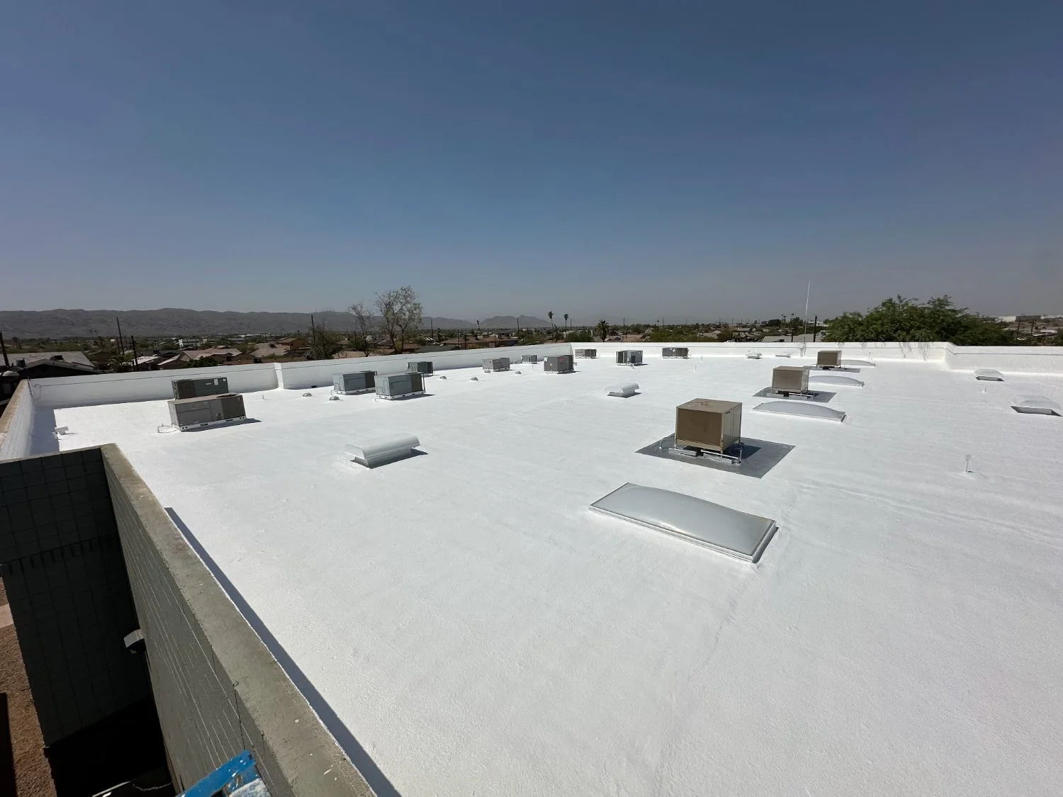 Wide view of a completed commercial foam roof deck
